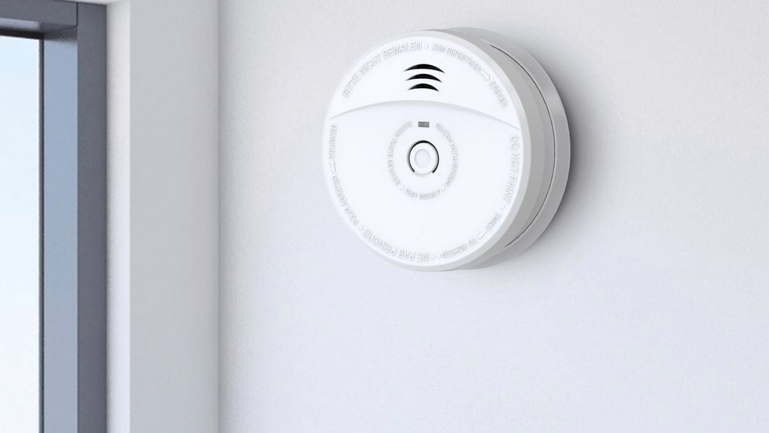 Smoke alarm mounted on the wall.