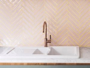 Bathroom tiles with a sink.