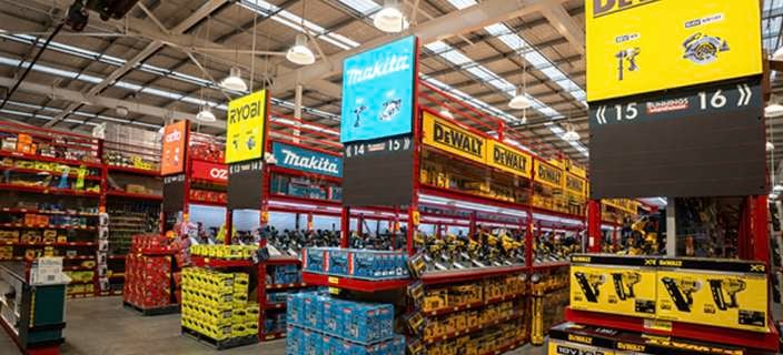    a {     text-decoration: none;     color: #464feb; } tr th, tr td {     border: 1px solid #e6e6e6; } tr th {     background-color: #f5f5f5; }     A wide view of toolshop with branded displays and shelves stocked with power tools and accessories.