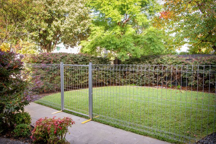 Rapid Products fencing and gate solutions installed in a residential outdoor setting