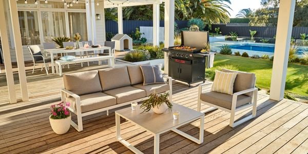 BBQ and couch set in shot