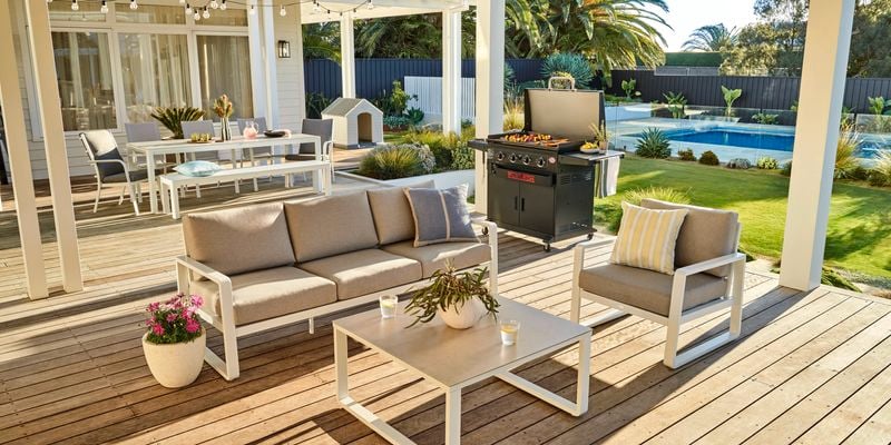 BBQ and couch set in shot