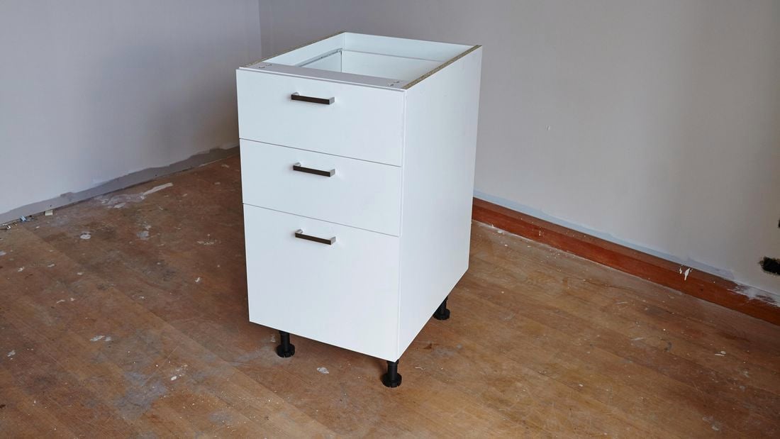 A free-standing three-drawer cabinet