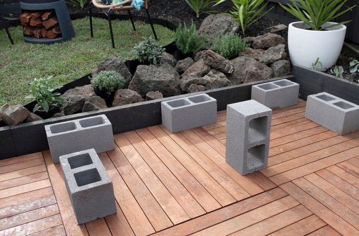 Concrete blocks sitting on deck.