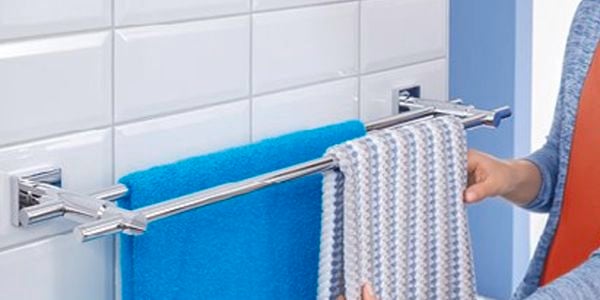 Towel rail with towels hanging.