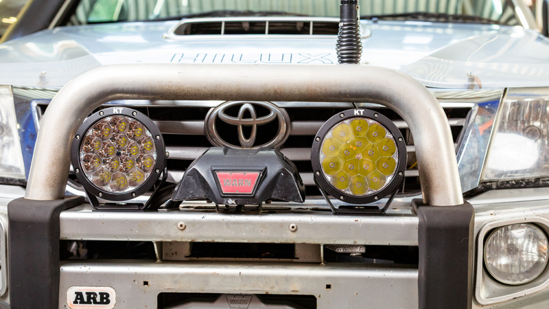 Close-up of KT 7'' LED driving light mounted to front bull bar.