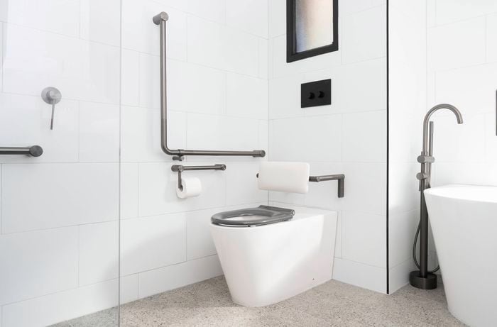 Supportive raised toilet area offers added height and stability 