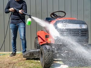Gerni foam sprayer cleaning a ride on lawn mower