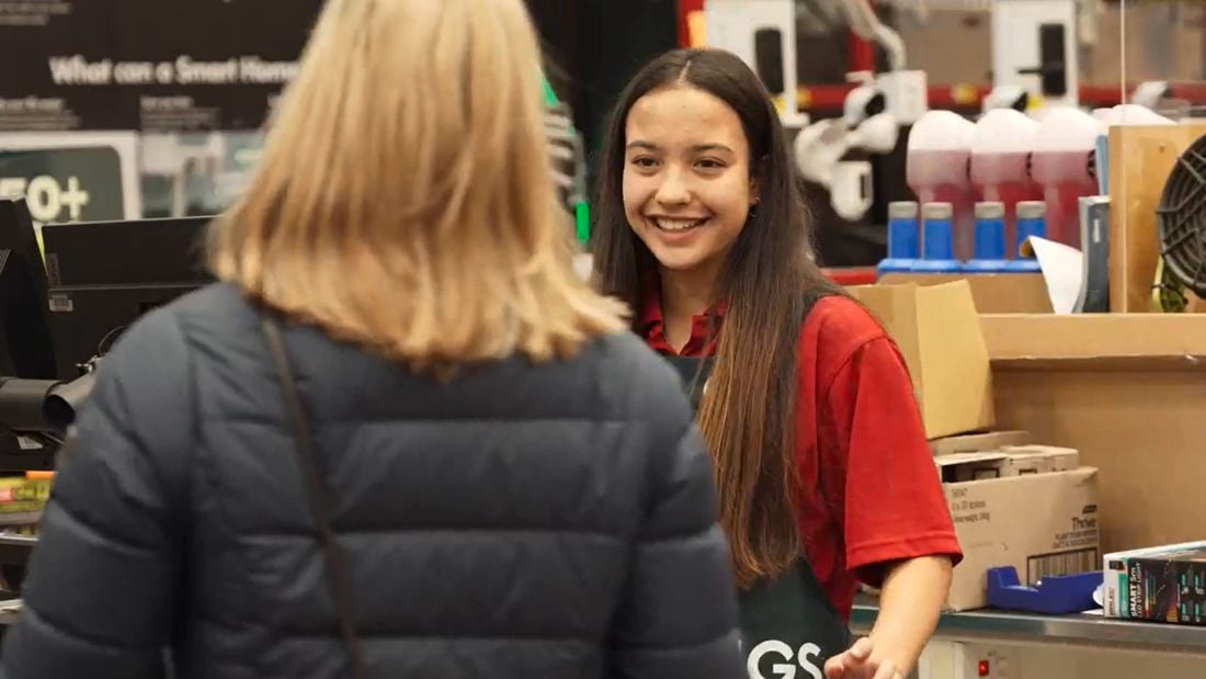 Bunnings team member serving a customer