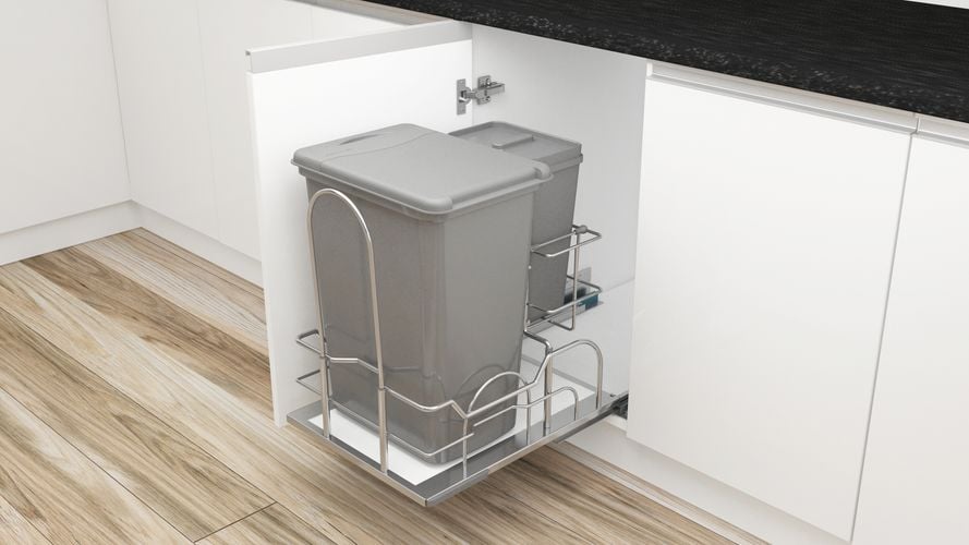 Open kitchen cupboard with pull out shelf for waste bins