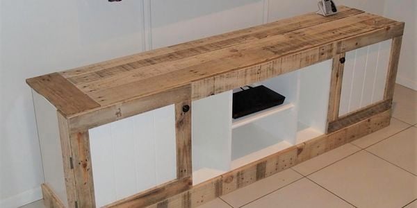 A D.I.Y. timber entertainment unit made from recycled timber in a living area