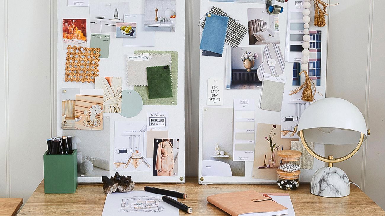 A blue and green themed moodboard on a timber desk