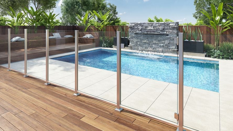 Pool fencing between a outdoor pool and a deck