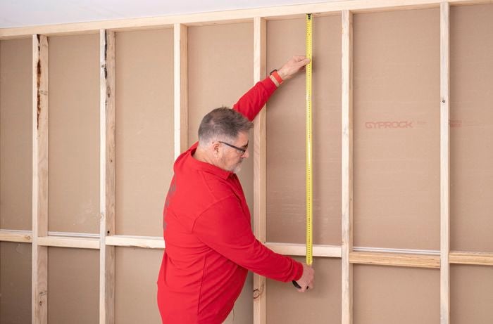 Measure the gaps between the wall cavity