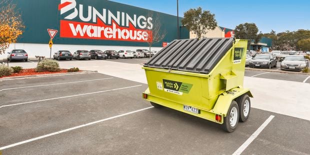 Mobile Skip parked in a Bunnings carpark
