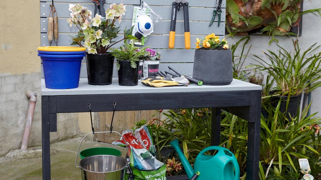 Potting bench in a garden setting.