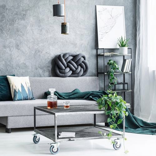 Living room and mesh coffee table with wheels.