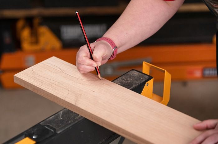 Marking paddle board handles on hardwood material