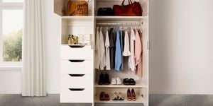 Bedroom storage with hanging clothes, shoes and bags.