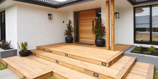 Front of house with timber deck.