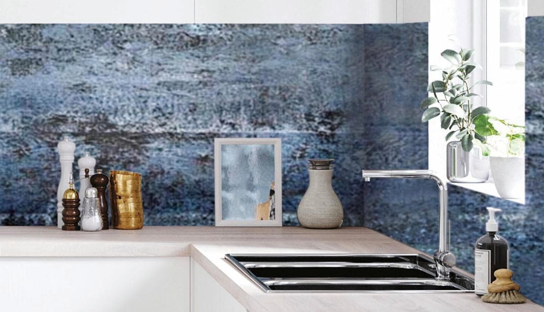 Scandi-style minimal kitchen featuring a blue splashback