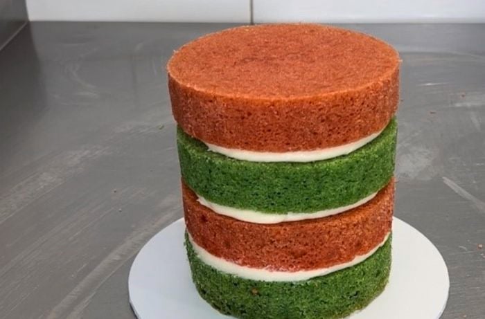 red and green sponge cake filled with buttercream each layer