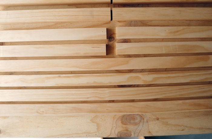 Timber bench legs on a workbench