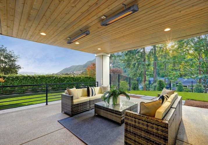 Heat lamps mounted to the roof for an outdoor dining area