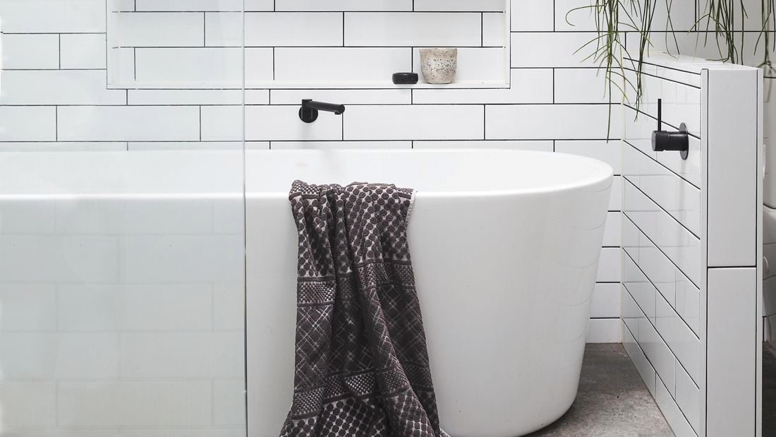 modern tiled bathroom with a bathroom tub