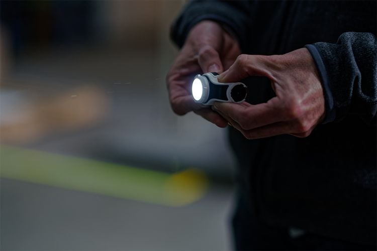 Person holding head torch