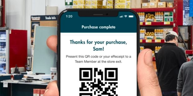 Phone with the PowerPass app open at a purchase confirmation screen