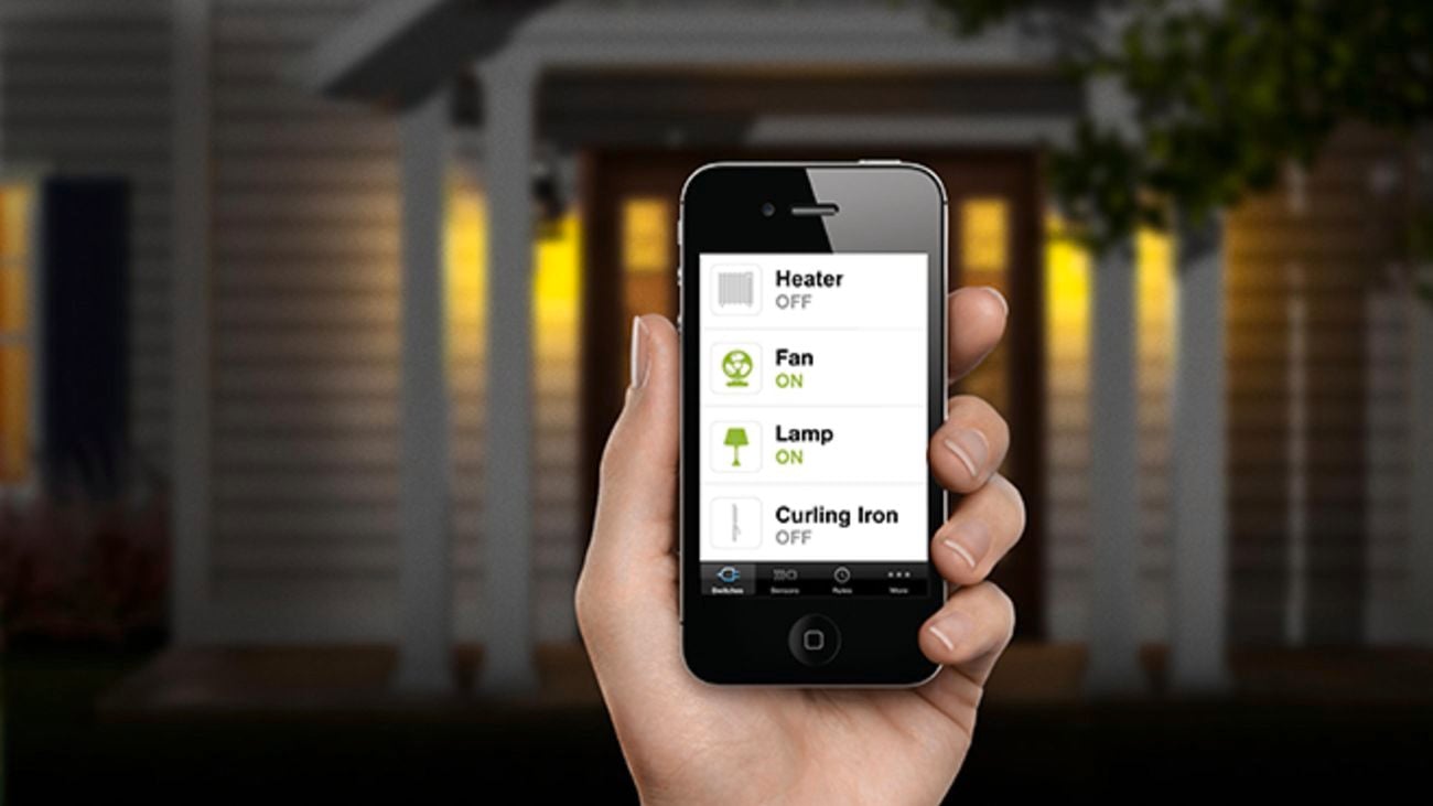 Mobile phone in hand with app open.