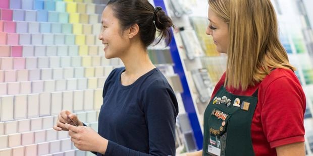 Bunnings customer being assisted with Colour Matching service in store.