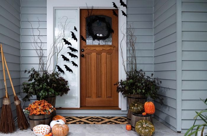 Halloween theme front porch with wreath on door