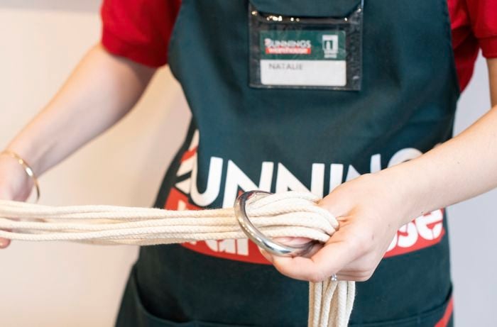 A person plaiting cotton rope