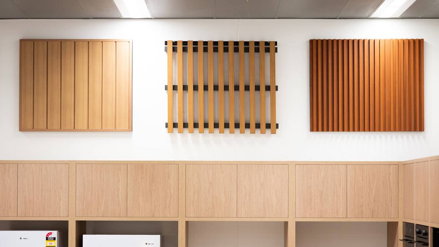 Wall lining and architectural panel display showcasing timber batten profiles and decorative wall finishes in various styles.