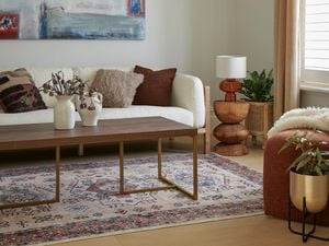 A lounge room with a white couch