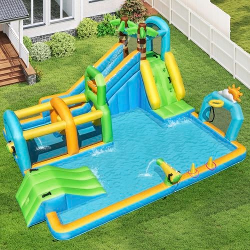 An inflatable jumping castle outside on a grassed area.