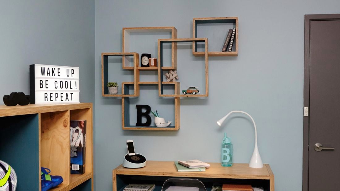 Shadow boxes hanging on wall.