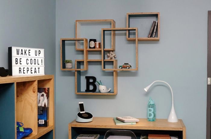 Shadow boxes hanging on wall.