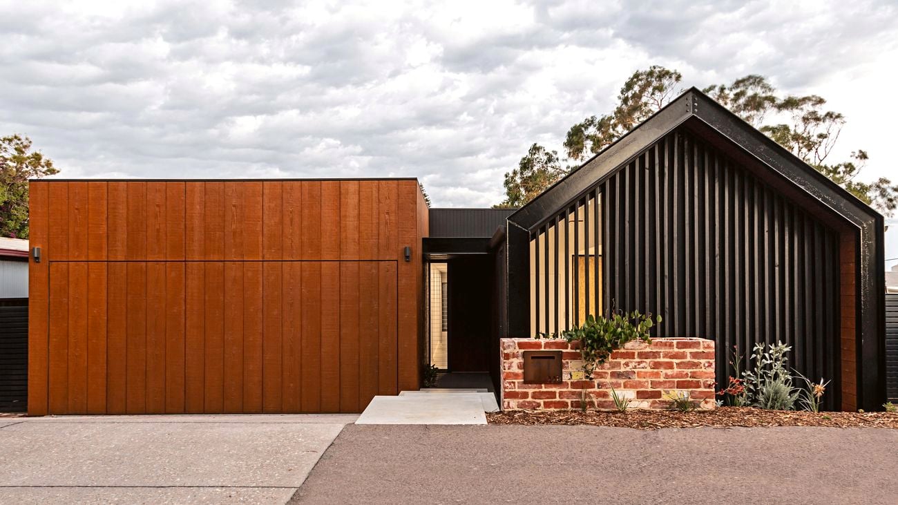 Front exterior of a house with weathertex unprimed ‘Weathergroove’ panels in Natural.