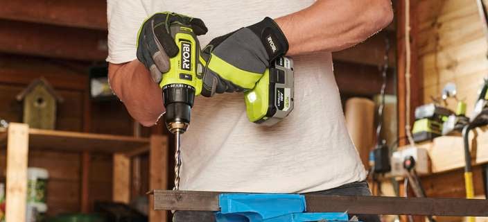 Ryobi drill in use while on work bench
