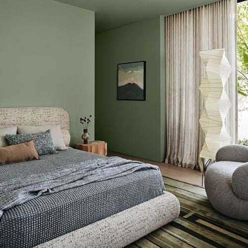 Green bedroom styled.