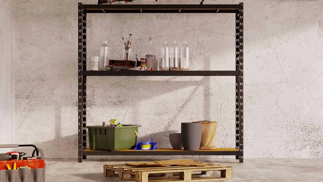 Header with garage shelving in garage set up with pallet in front of it 