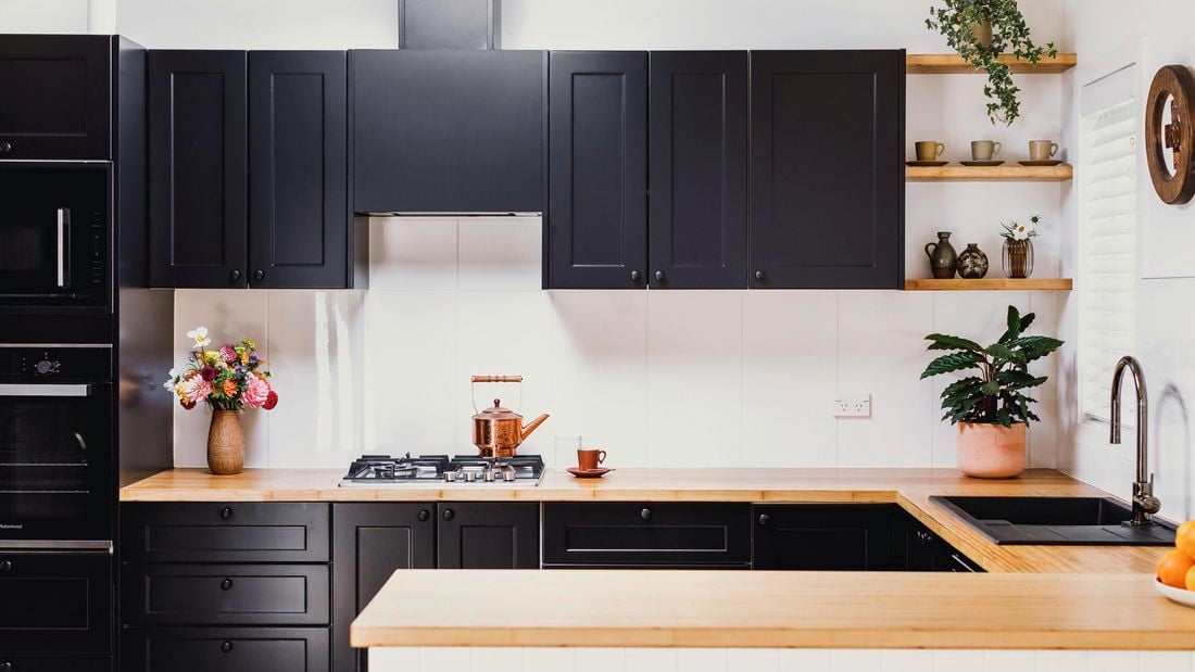 Black themed kitchen.
