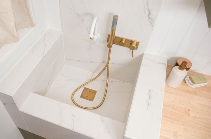 Close-up of a large sink in a laundry room.