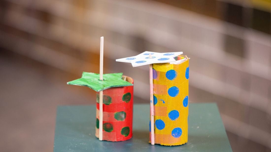 DIY kaleidoscopes are placed on the table.