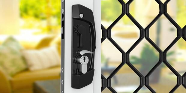 Rolltrak door lock installed to a front mesh door.