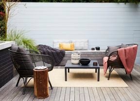 Outdoor deck with furniture.