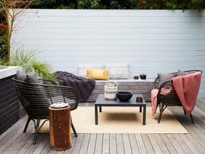 Outdoor deck with furniture.